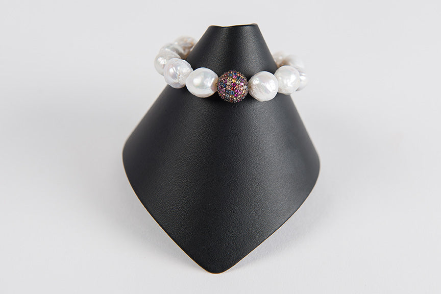White baroque pearls with multi sapphire bead