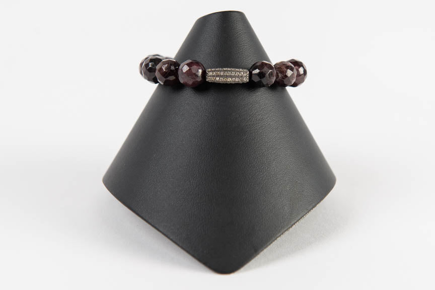 Faceted garnet and pave diamond bar