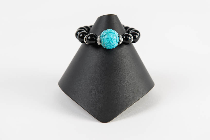 Black onyx with carved natural turquoise