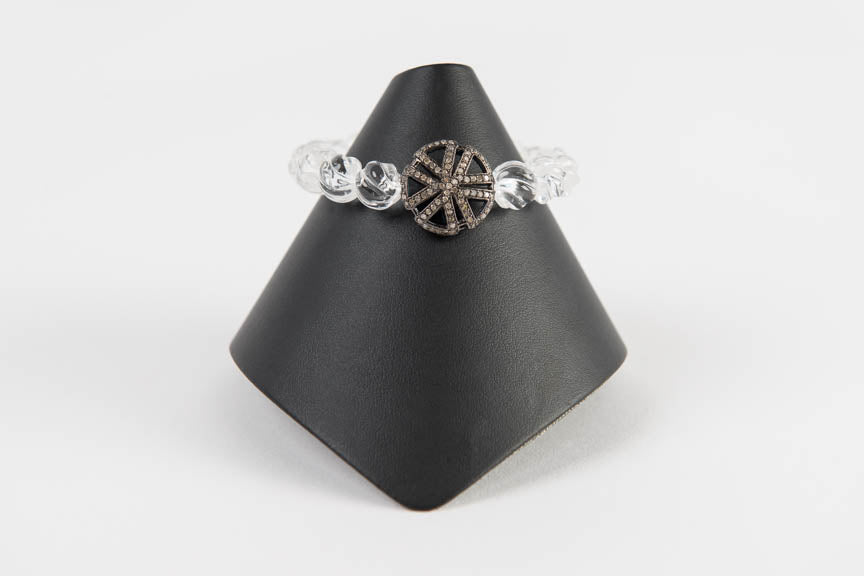 Carved rock crystal with pave diamond bead