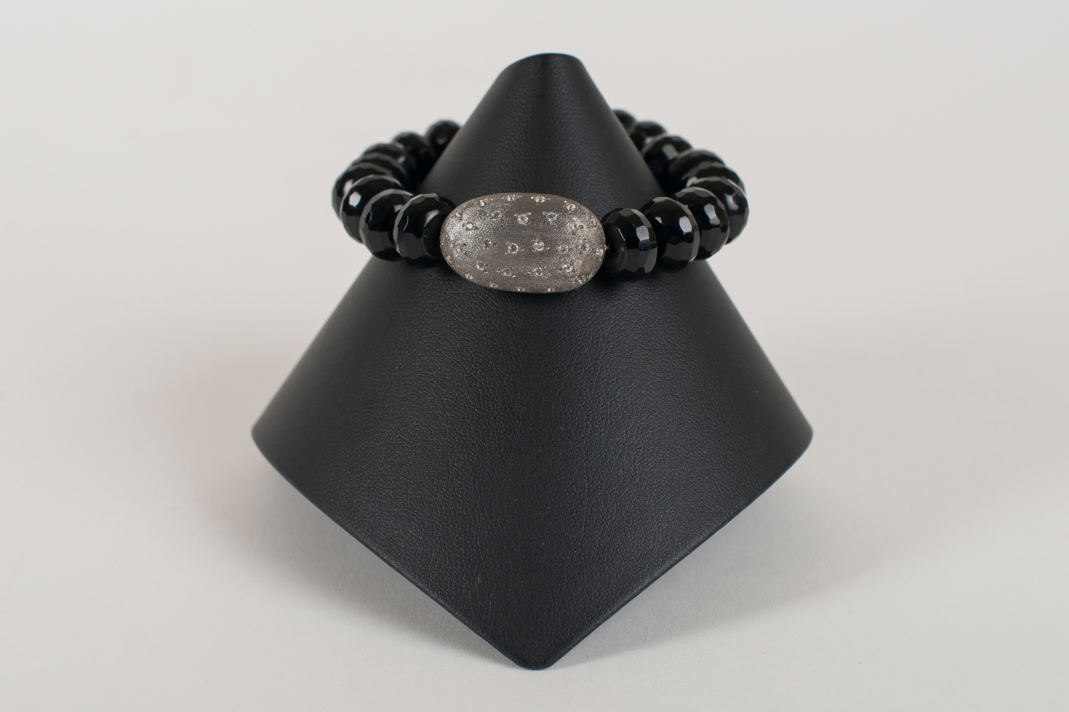 Faceted Black Onyx Rondelle with White Topaz and Sterling Focal Bead