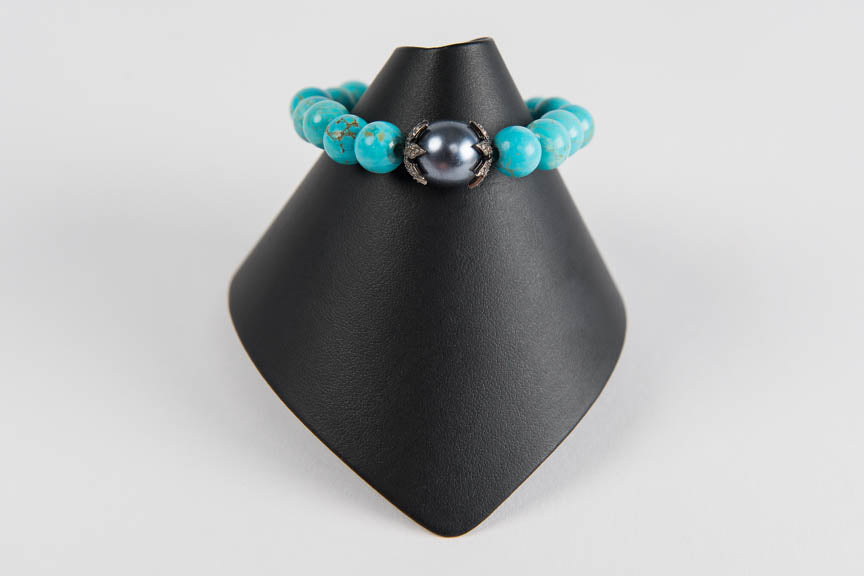 Turquoise with mother of pearl and pave diamond bead caps