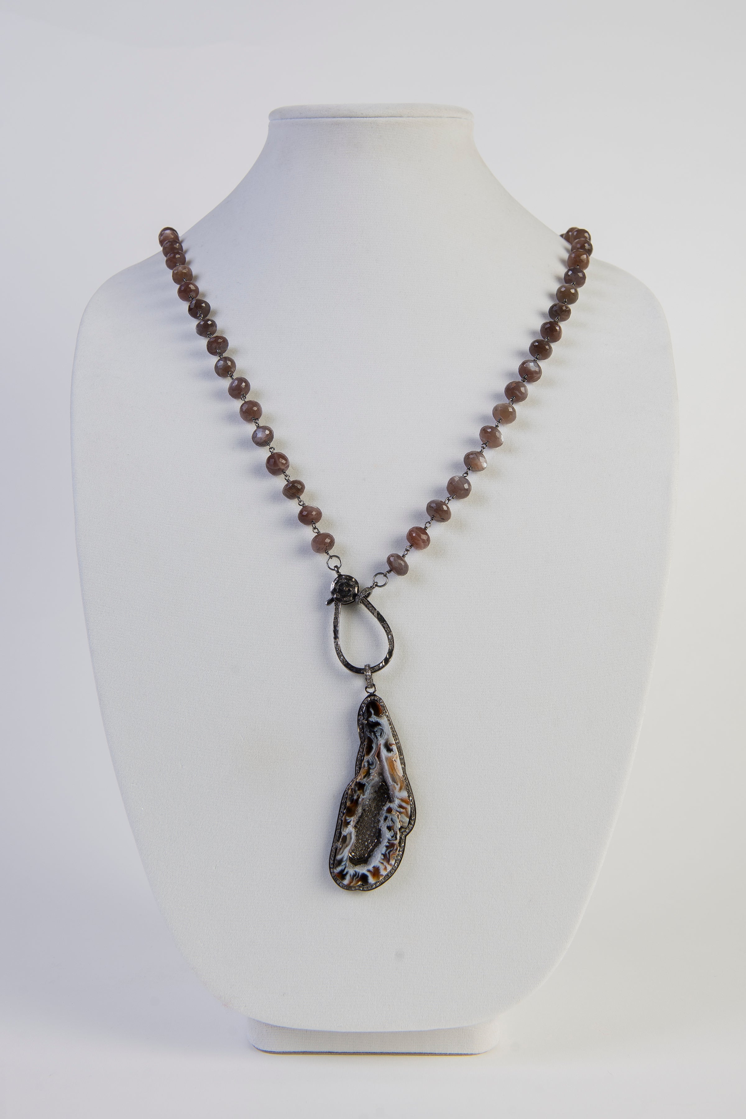 Druzy and pave diamond pendant on moonstone rosary chain