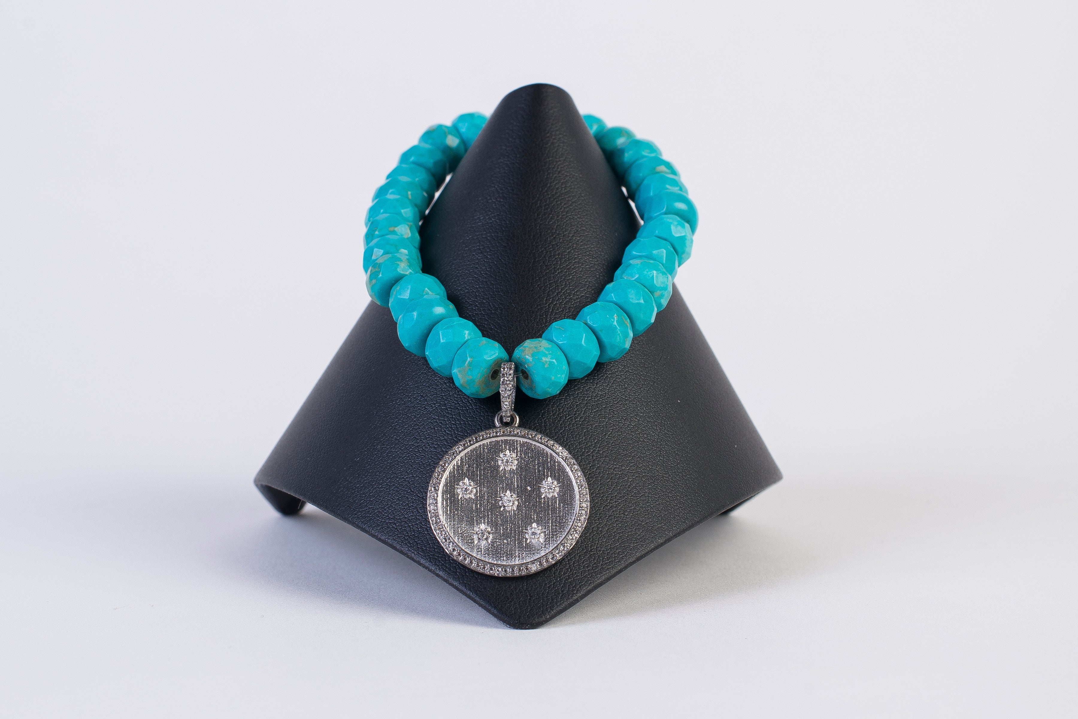 Turquoise rondelle and white topaz bracelet
