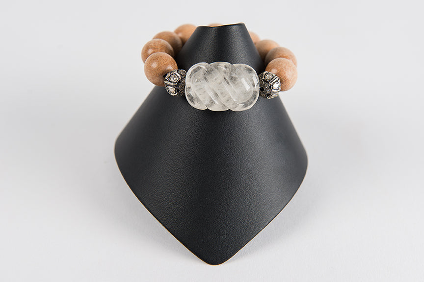 Wood and carved rock crystal with rose cut diamond beads