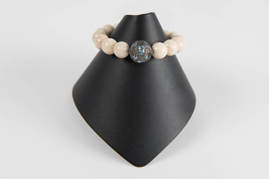 Natural agate with blue topaz bead