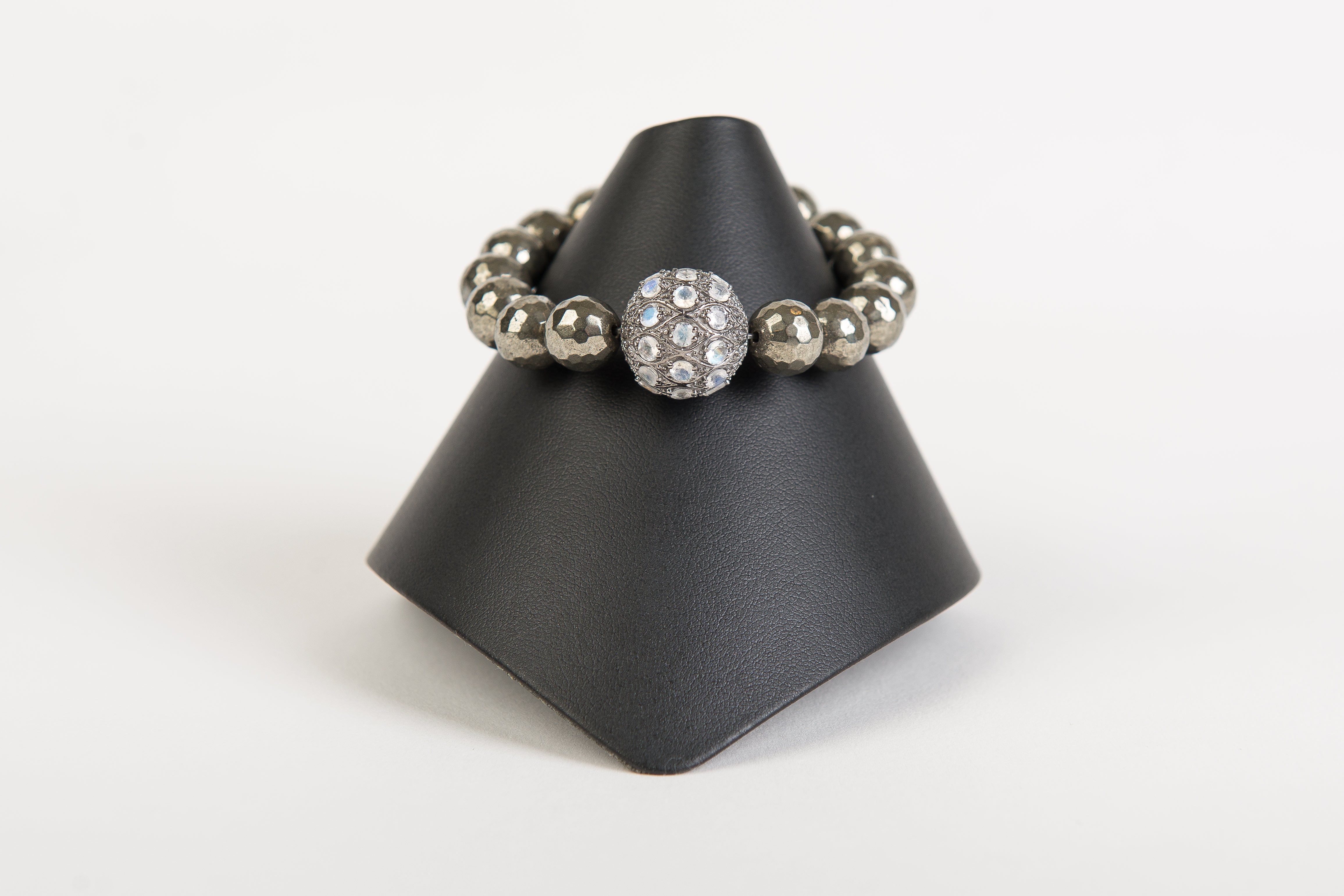 Moonstone and white topaz focal bead on faceted pyrite