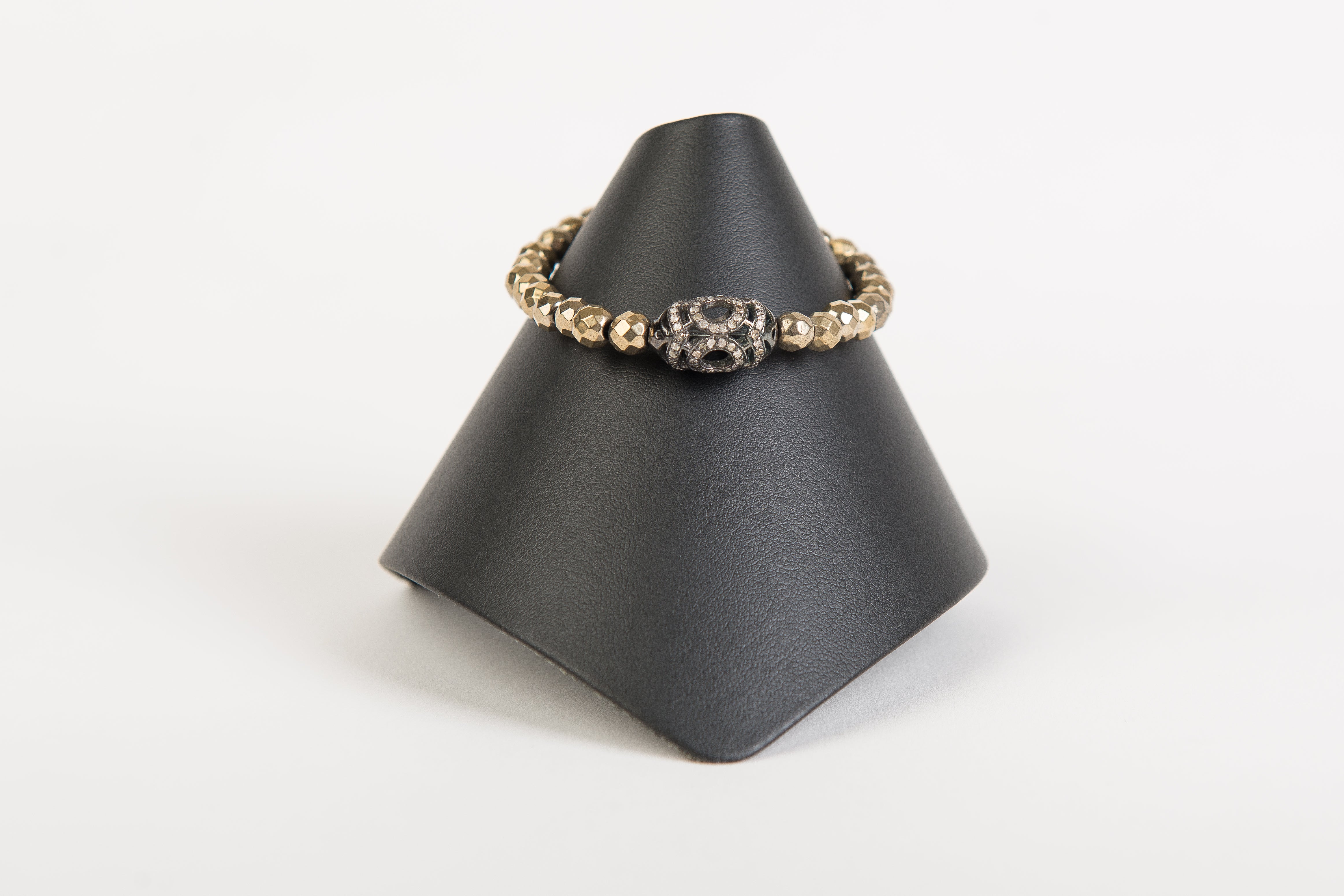 Pave diamond focal bead with gold faceted hematite