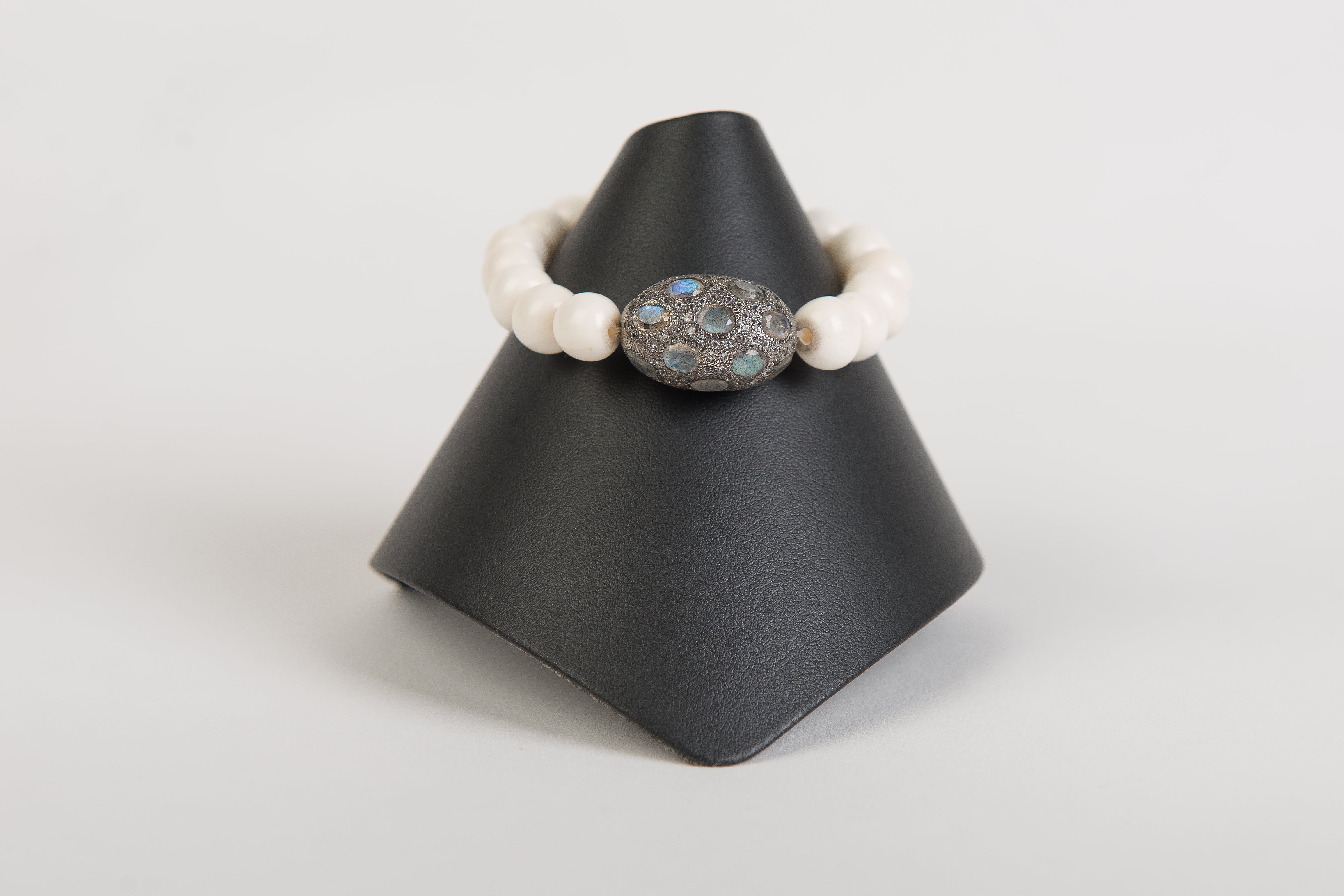 Labradorite and white topaz focal bead on bone