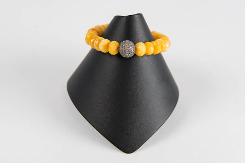 Faceted yellow agate with pave diamond bead