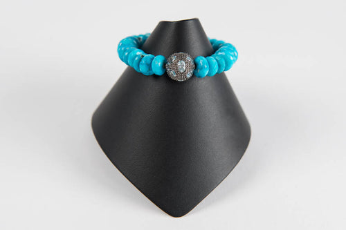 Faceted arizona turquoise with blue topaz bead