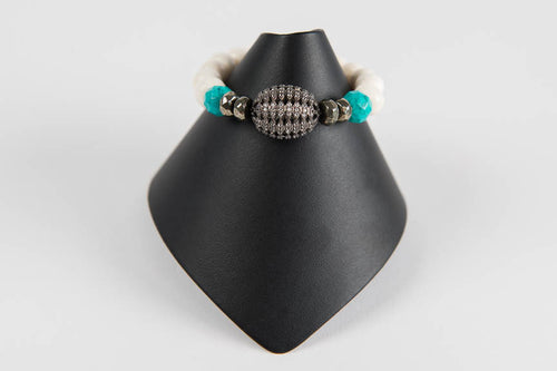 Bone and turquoise and pyrite with white topaz bead