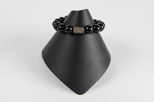 Black onyx and pave diamond bead