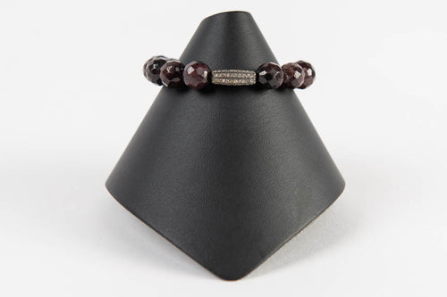 Faceted garnet and pave diamond bar