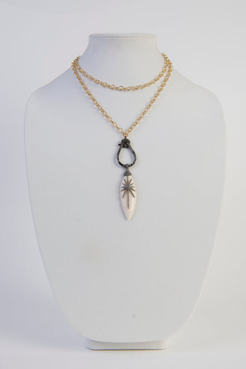 Bone and white topaz necklace