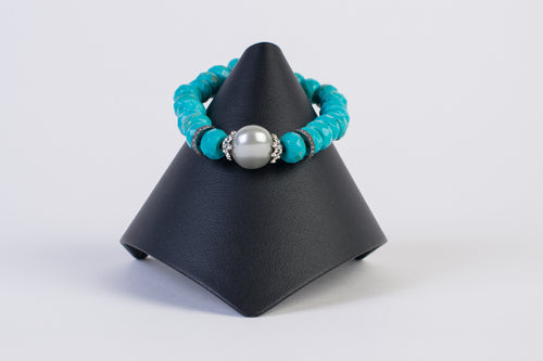 Turquoise and pearl and pave diamond bracelet.
