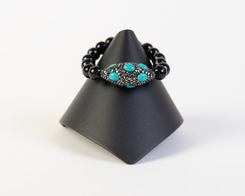 Turquoise , hematite on black onyx