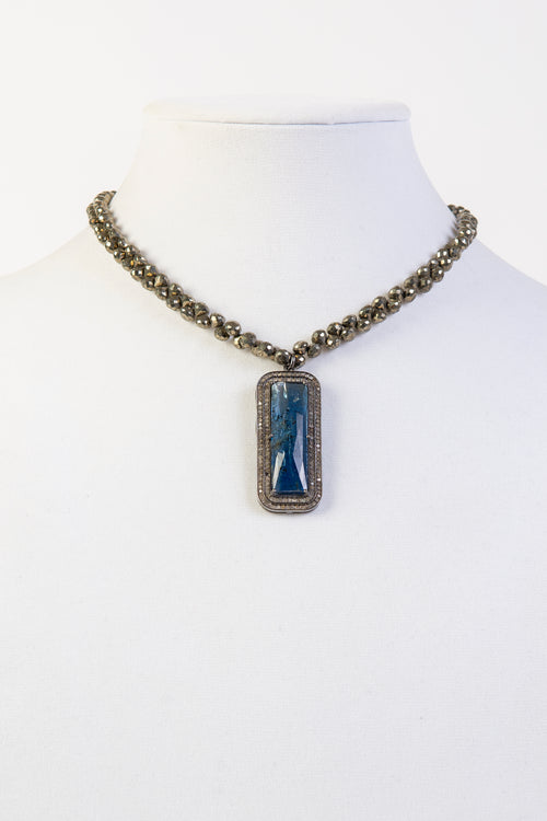Kayanite and pave diamond pendant on pyrite briolettes