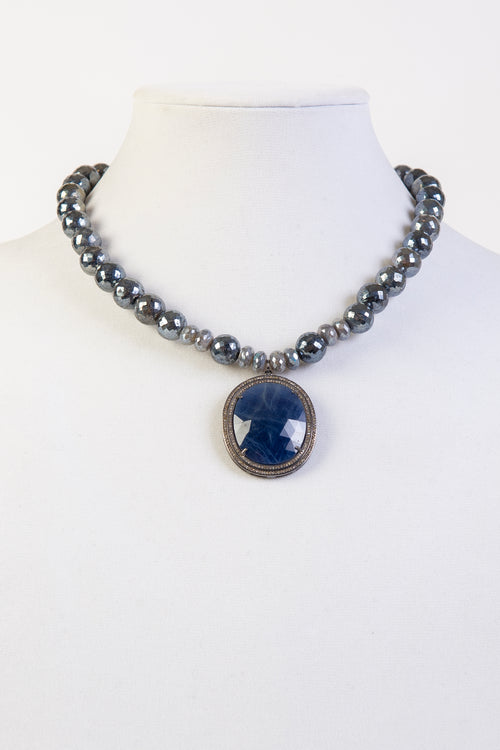 Sapphire and pave diamond pendant on mystic labradorite