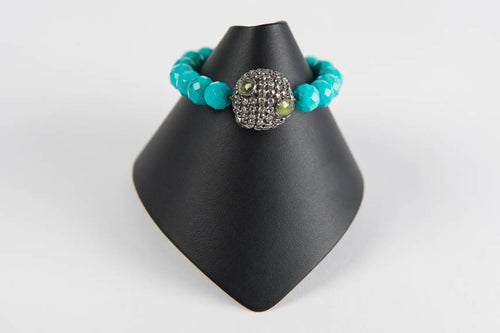 Faceted turquoise with rock crystal and peridot bead