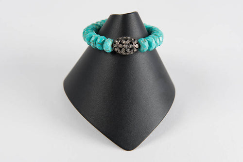 Turquoise rondelle with pave diamond bead