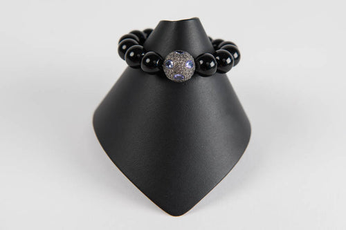 Black onyx with tanzanite and white topaz bead