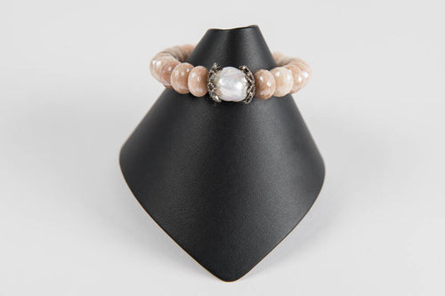 Faceted peach moonstone with baroque white pearl and pave diamond caps