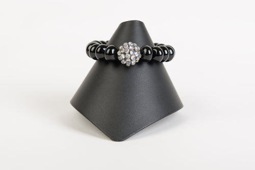 Moonstone focal bead with black onyx rondelles