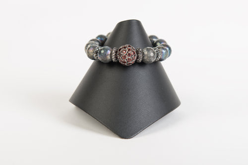 Garnet focal bead with hematite rondelles on ab labradorite